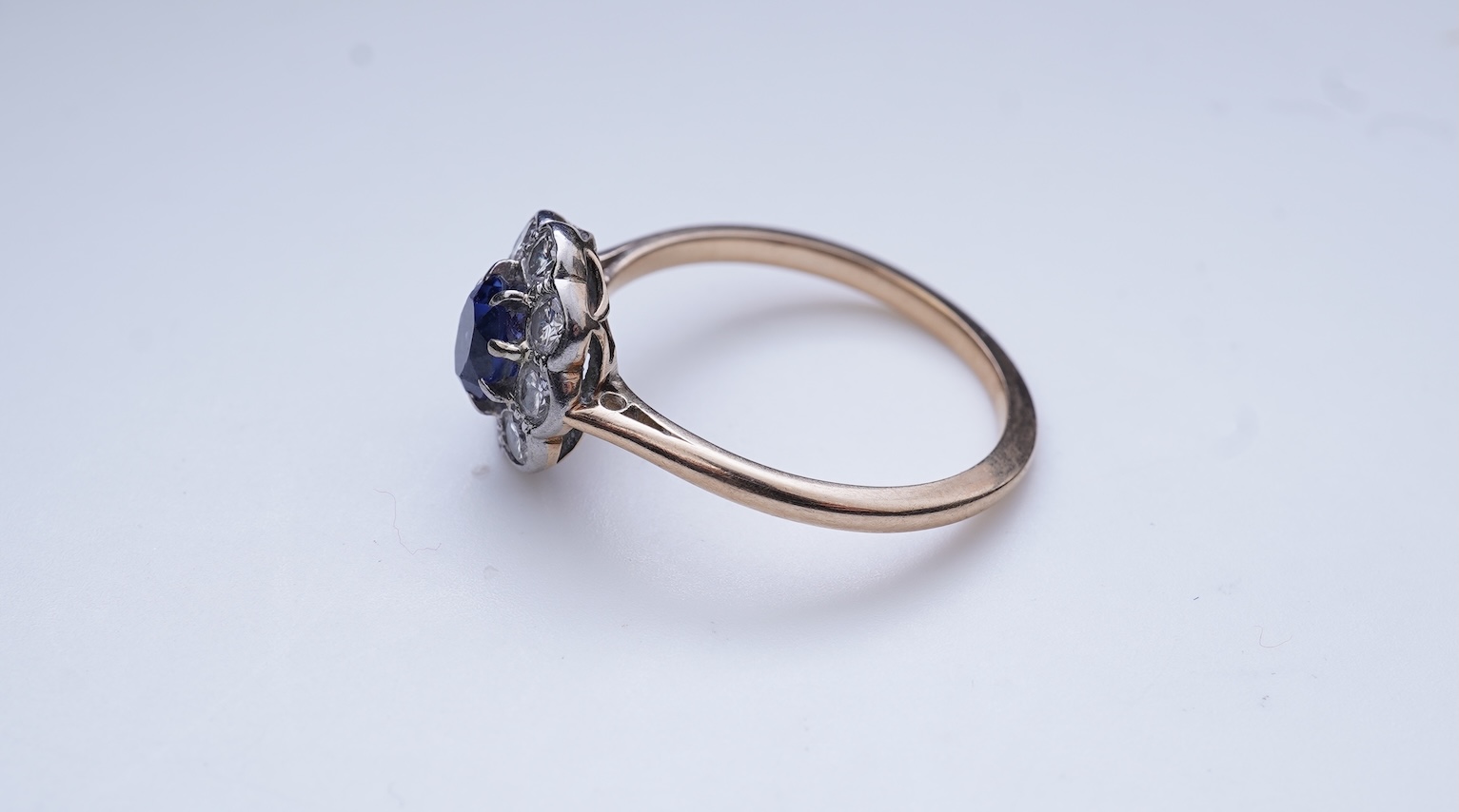 A synthetic sapphire and diamond ring
